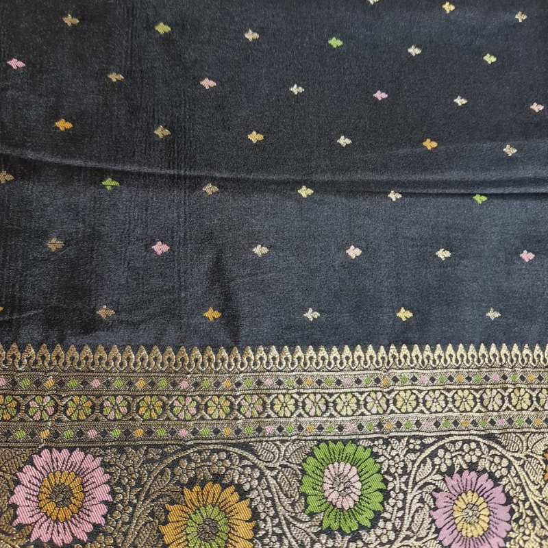 Black Benarasi saree with intricate gold zari detailing with tassels