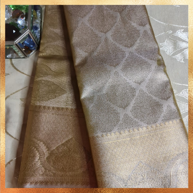 Bridal Kanjivaram Flesh Pink body with gold work & golden zari. Perfect for weddings & festive wear. Handpicked collection at The Saree Mahal