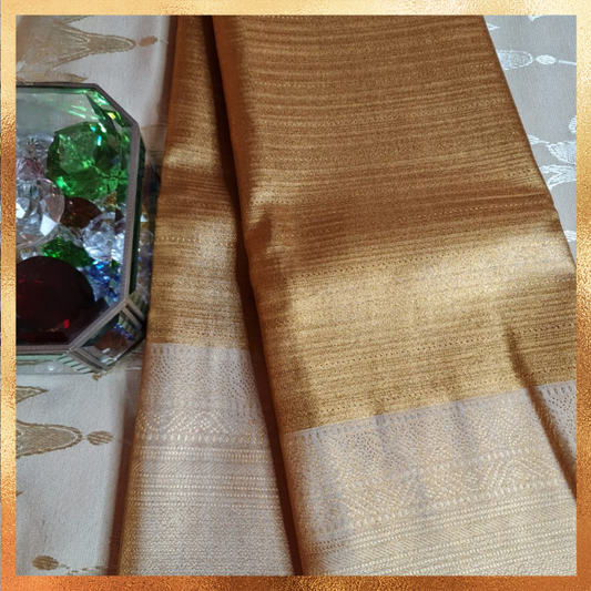 Bridal Kanjivaram golden body with beige border & golden zari. Perfect for weddings & festive wear. Handpicked collection at The Saree Mahal