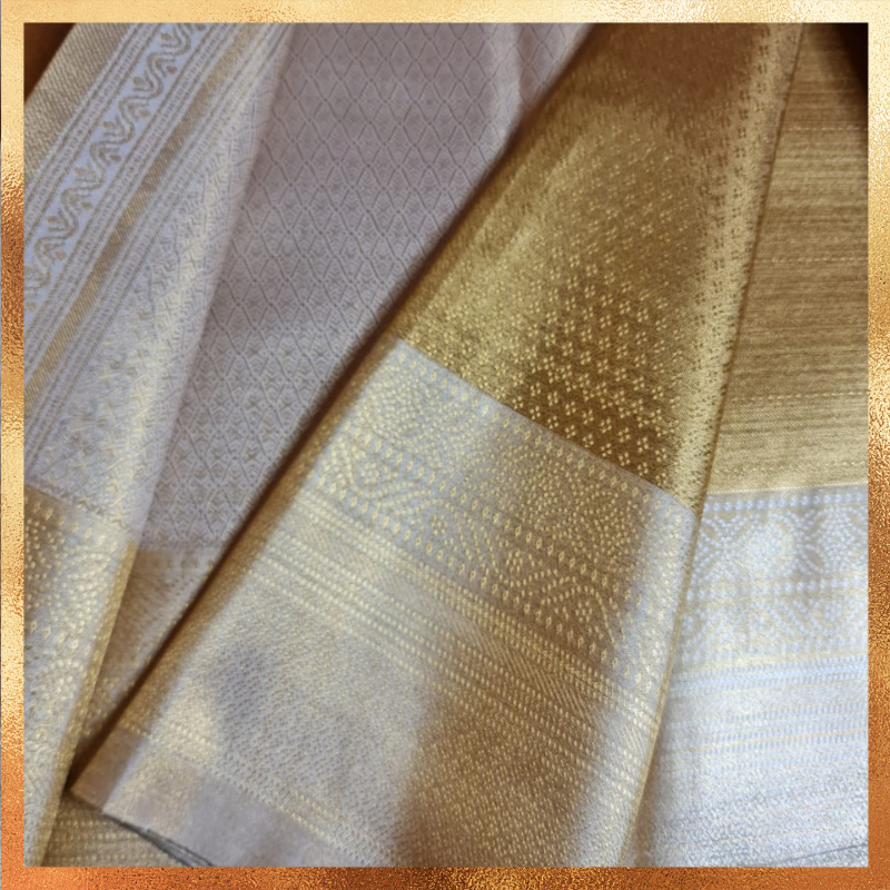 Bridal Kanjivaram golden body with beige border & golden zari. Perfect for weddings & festive wear. Handpicked collection at The Saree Mahal