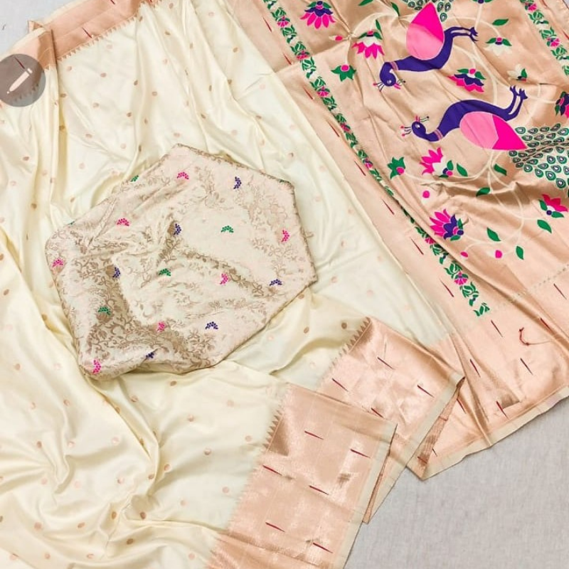 Handwoven Ceam color Paithani saree with traditional colorful peacock and lotus motifs in gold zari border with tassels