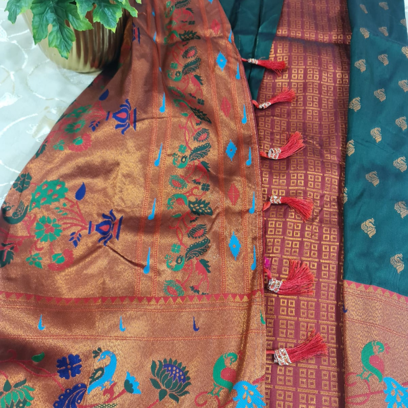 Handwoven Dark Green Paithani saree with traditional colorful peacock and lotus motifs in gold zari border