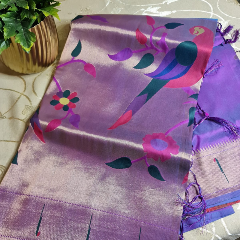 Dual Tone Mauve Paithani saree with traditional peacock & lotus motifs in gold zari border with tassels