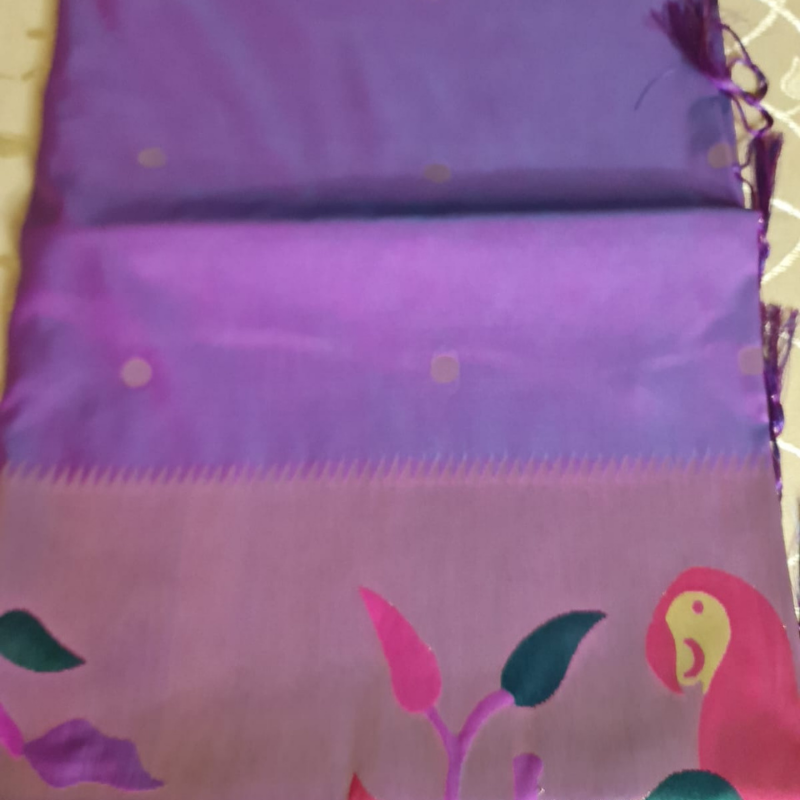 Dual Tone Mauve Paithani saree with traditional peacock & lotus motifs in gold zari border with tassels