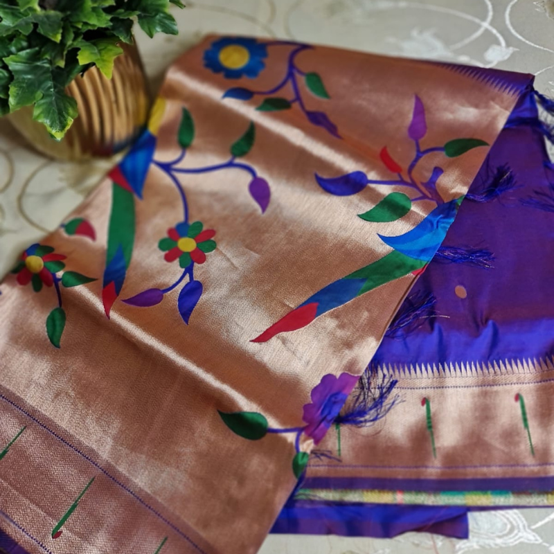 Dual Tone Mauve Paithani saree with traditional peacock & lotus motifs in gold zari border with tassels