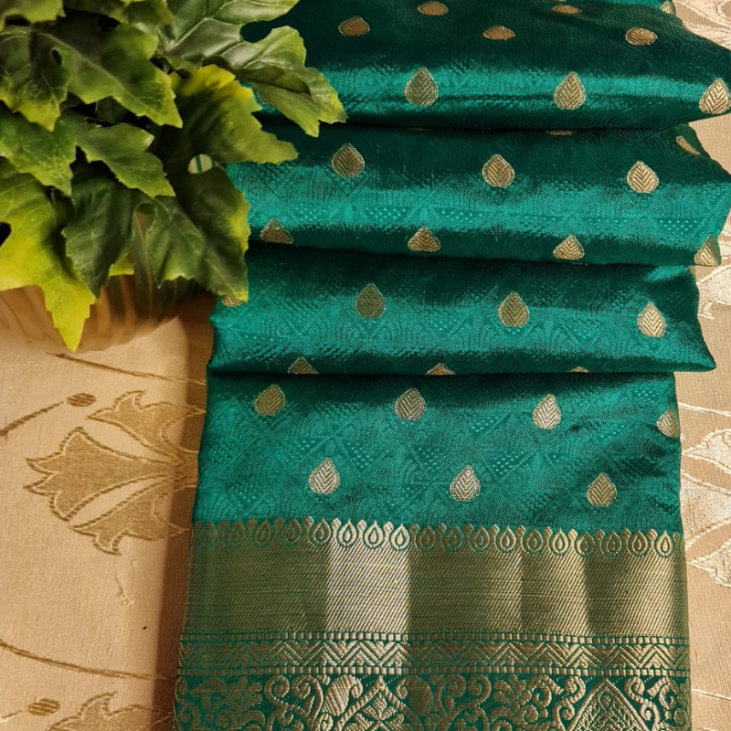 Green Benarasi silk blend saree with intricate gold zari detailing & motifs