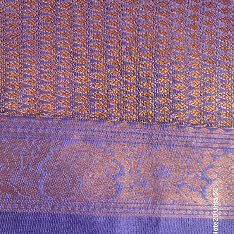 Kanchi Semi Silk saree with intricate gold zari detailing-green & purple