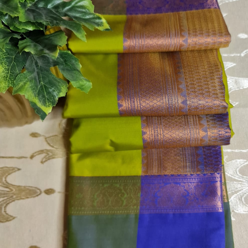 Kanchi Semi Silk saree with intricate gold zari detailing-green & purple