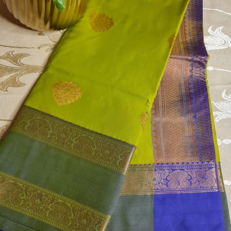 Kanchi Semi Silk saree with intricate gold zari detailing-green & purple