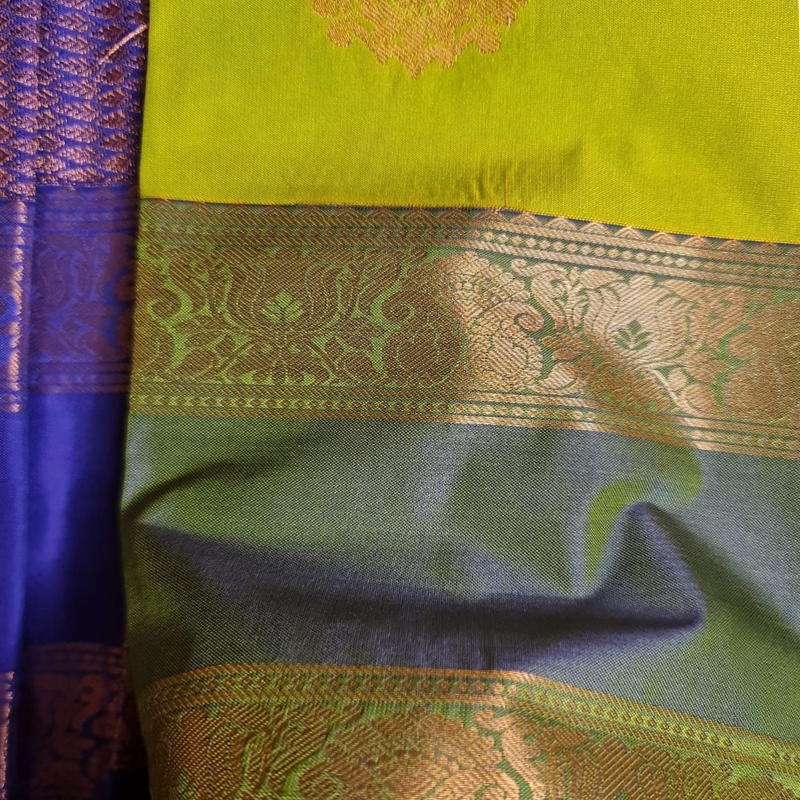 Kanchi Semi Silk saree with intricate gold zari detailing-green & purple