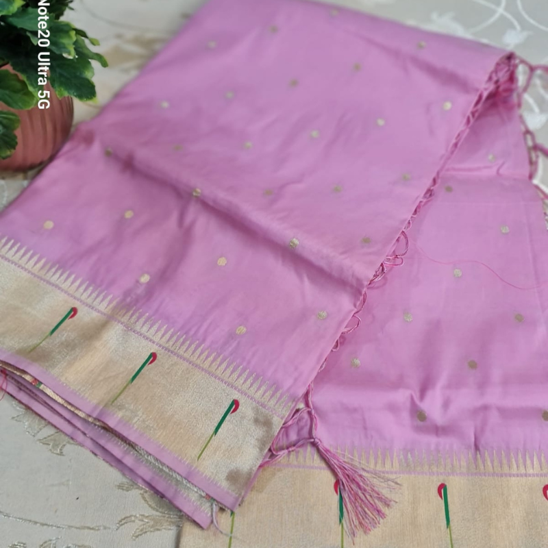 Light Pink Paithani saree with traditional peacock & lotus motifs in gold zari border with tassels