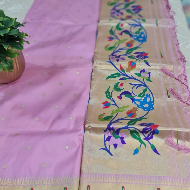 Light Pink Paithani saree with traditional peacock & lotus motifs in gold zari border with tassels