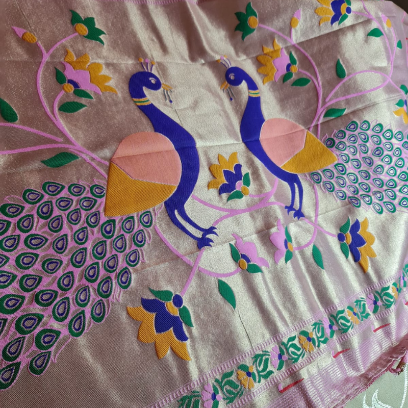 Handwoven Light Pink color Paithani saree with traditional colorful peacock and lotus motifs in gold zari border with tassels