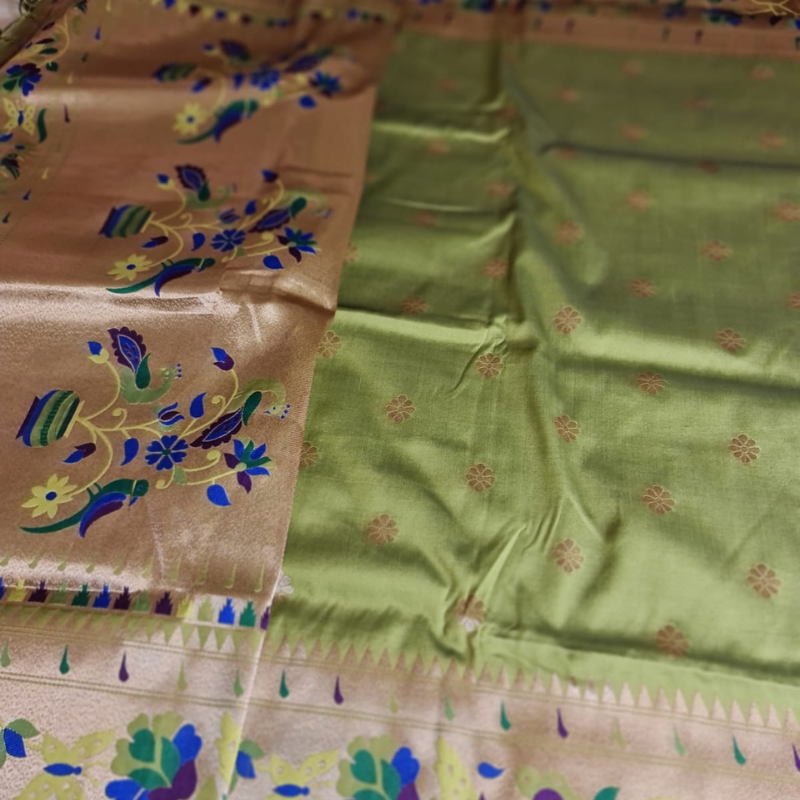Lime Green color Paithani saree with traditional peacock & lotus motifs in gold zari border with tassels