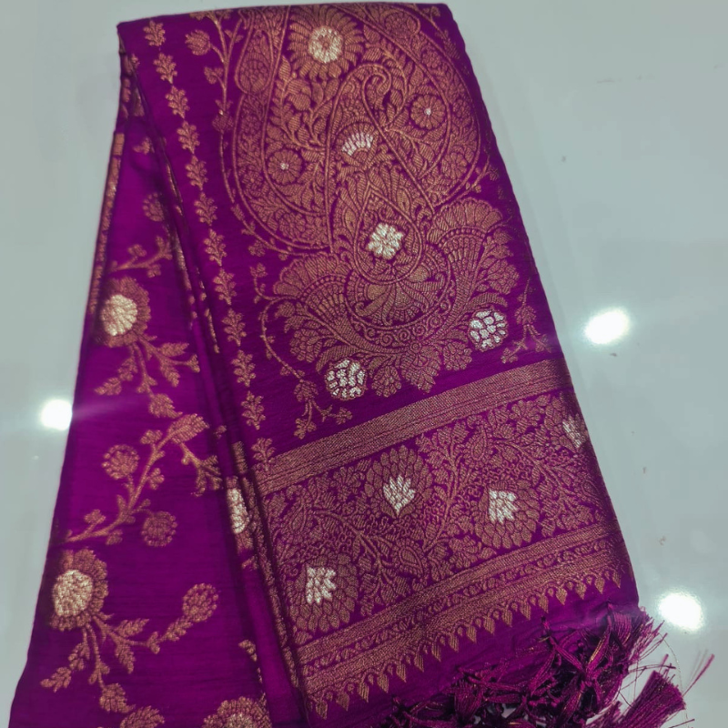 Magenta Benarasi saree with intricate gold zari detailing with tassels
