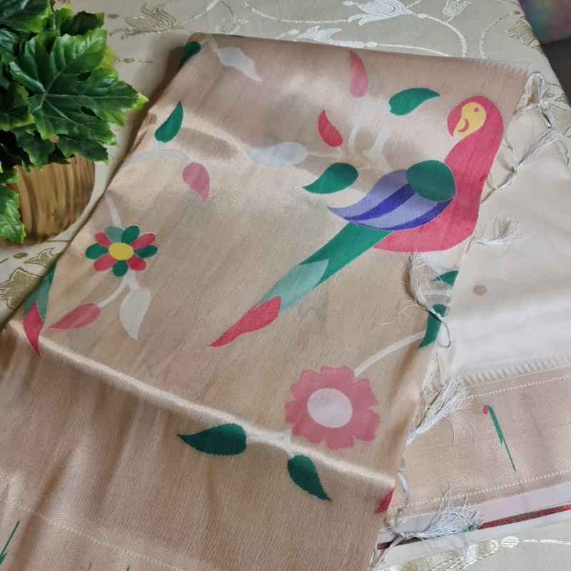 Off White Paithani saree with traditional peacock & lotus motifs in gold zari border with tassels