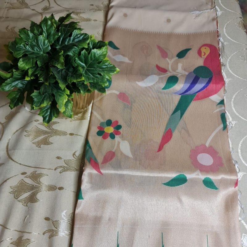 Off White Paithani saree with traditional peacock & lotus motifs in gold zari border with tassels