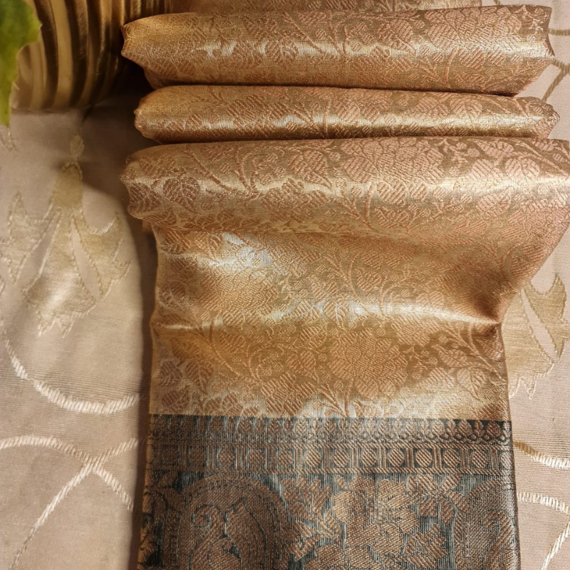 Intricately woven Gold Organza Saree with Dark Green Brocade Border – Elegant Drape