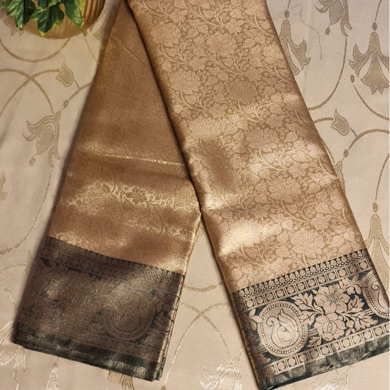 Intricately woven Gold Organza Saree with Dark Green Brocade Border – Elegant Drape
