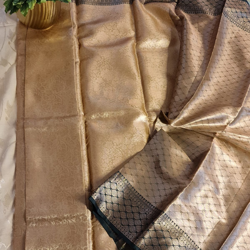 Intricately woven Gold Organza Saree with Dark Green Brocade Border – Elegant Drape