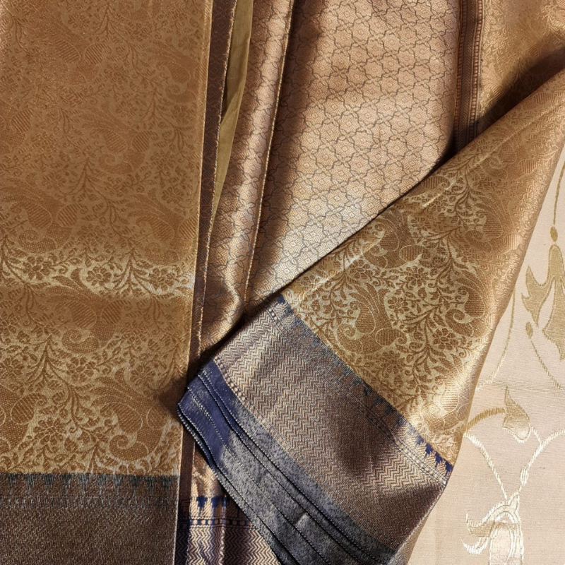 Intricately woven Gold Organza Saree with Navy Blue Brocade Border – Elegant Drape
