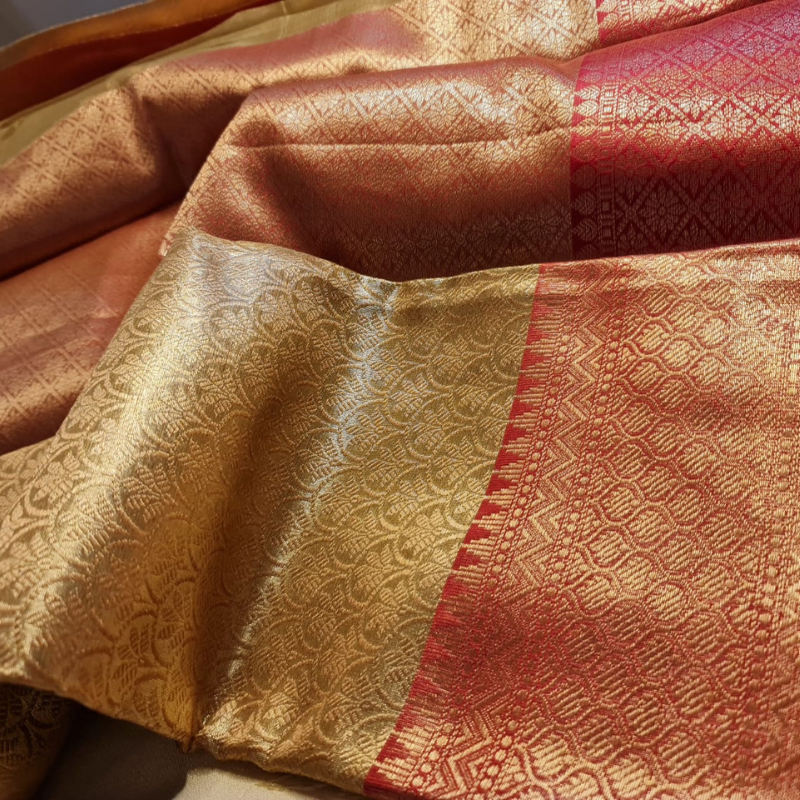 Intricately woven Gold Organza Saree with Red Brocade Border – Elegant Drape