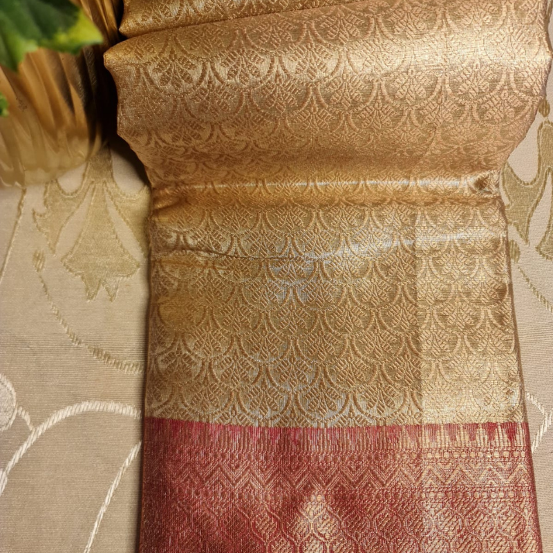 Intricately woven Gold Organza Saree with Red Brocade Border – Elegant Drape