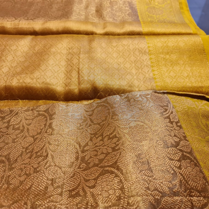 Intricately woven Gold Organza Saree with Yellow Brocade Border – Elegant Drape