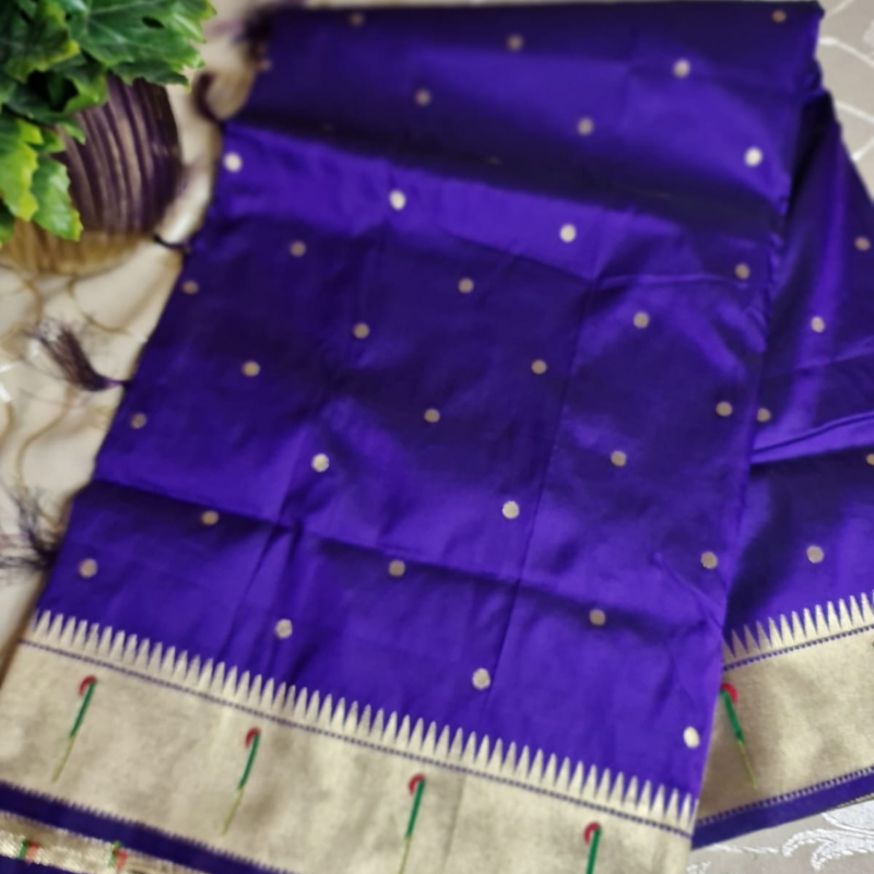 Royal Blue Paithani saree with traditional peacock & lotus motifs in gold zari border with tassels