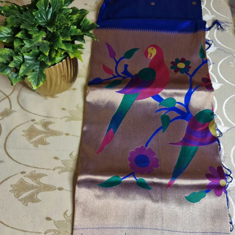 Royal Blue Paithani saree with traditional peacock & lotus motifs in gold zari border with tassels