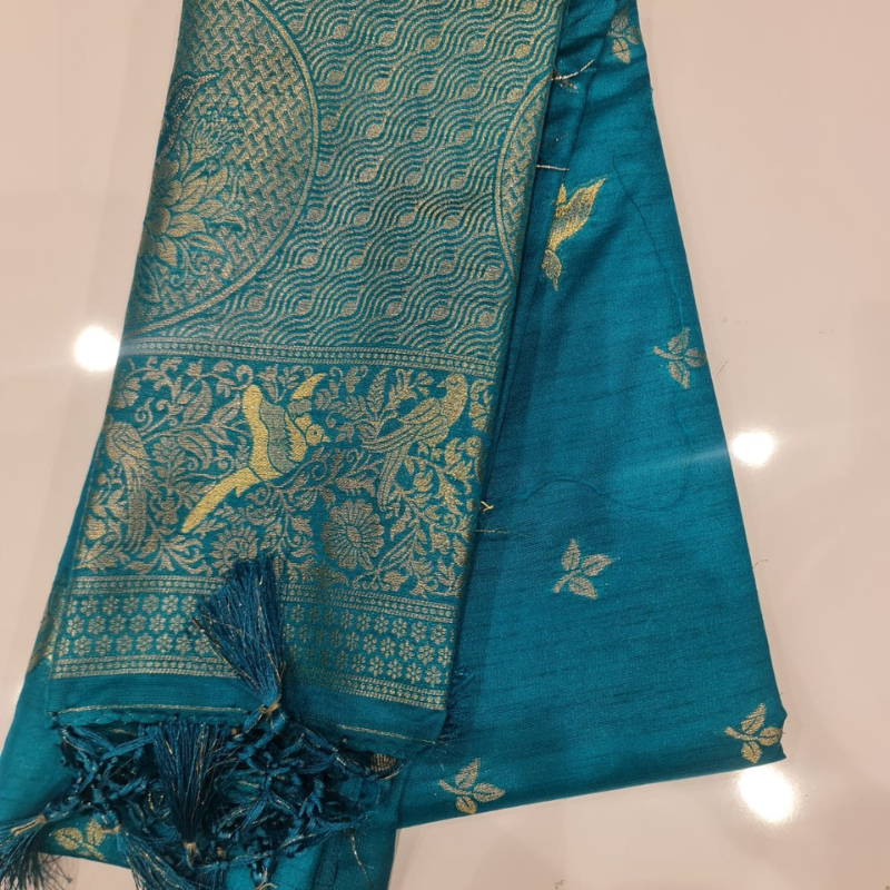 Teal Green Benarasi saree with intricate gold zari detailing with tassels
