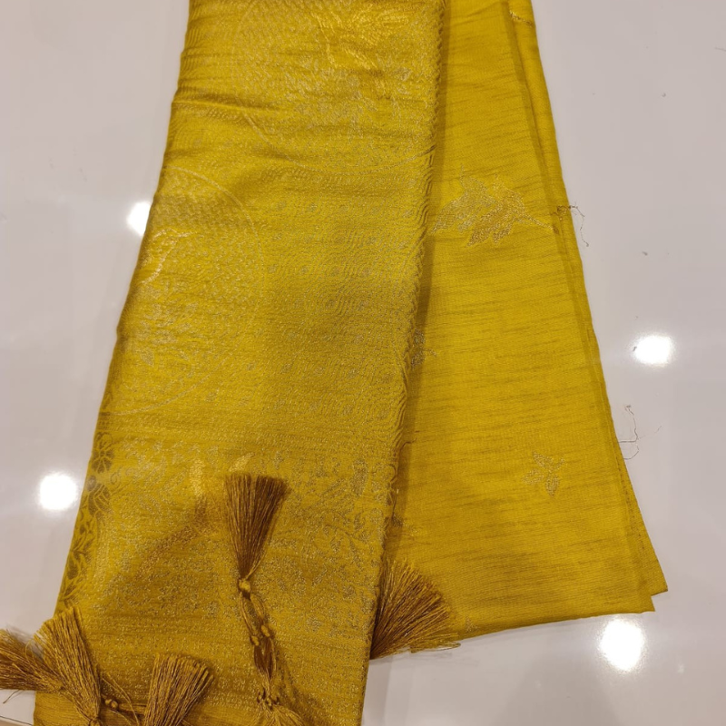 Yellow Benarasi saree with intricate gold zari detailing with tassels