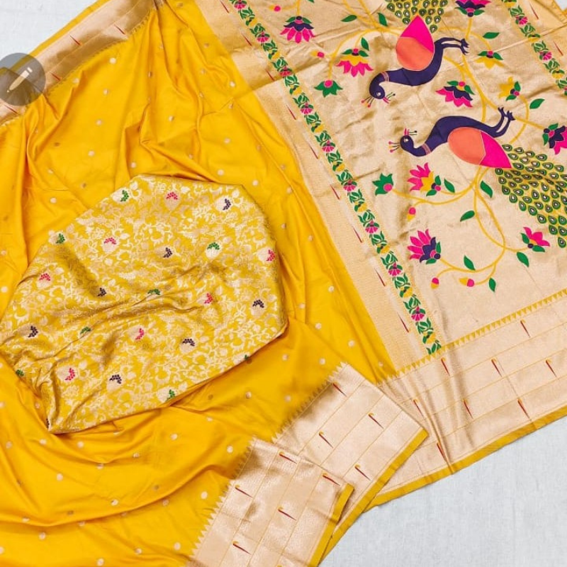 Handwoven Yellow color Paithani saree with traditional colorful peacock and lotus motifs in gold zari border with tassels