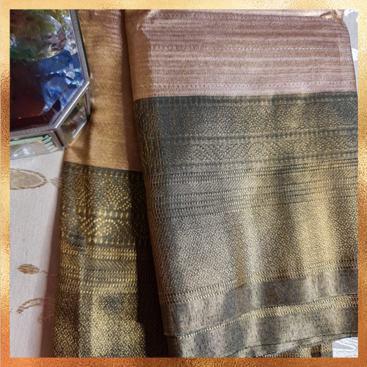 Bridal Kanjivaram golden body with dark green border & golden zari. Perfect for weddings & festive wear. Handpicked collection at The Saree Mahal