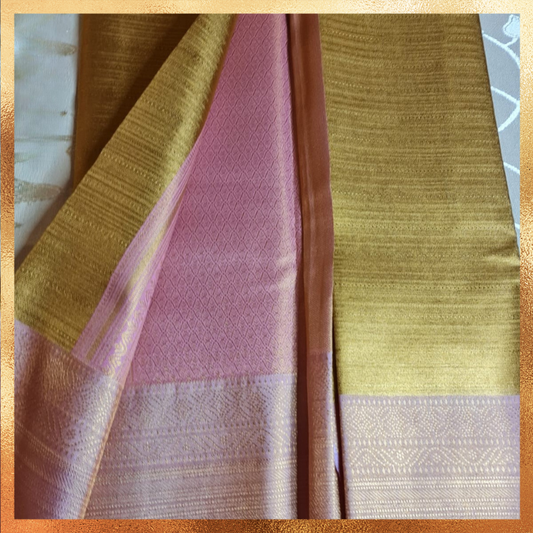 Bridal Kanjivaram golden body with light pink border & golden zari. Perfect for weddings & festive wear. Handpicked collection at The Saree Mahal