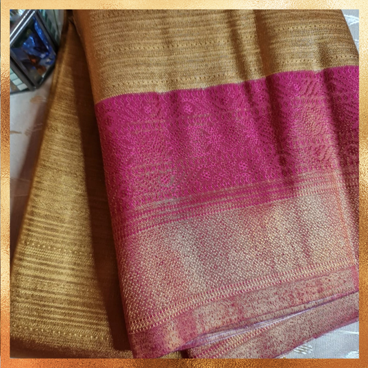 Bridal Kanjivaram golden body with magenta border & golden zari. Perfect for weddings & festive wear. Handpicked collection at The Saree Mahal