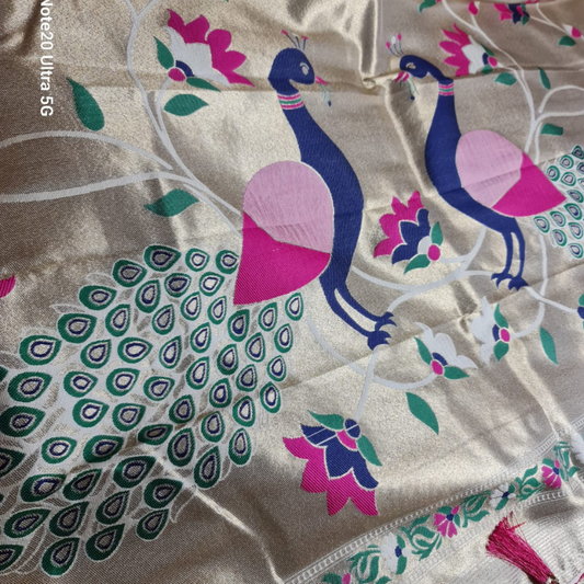 Handwoven Ceam color Paithani saree with traditional colorful peacock and lotus motifs in gold zari border with tassels 