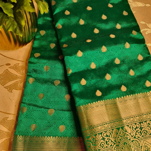 Green Benarasi silk blend saree with intricate gold zari detailing & motifs 