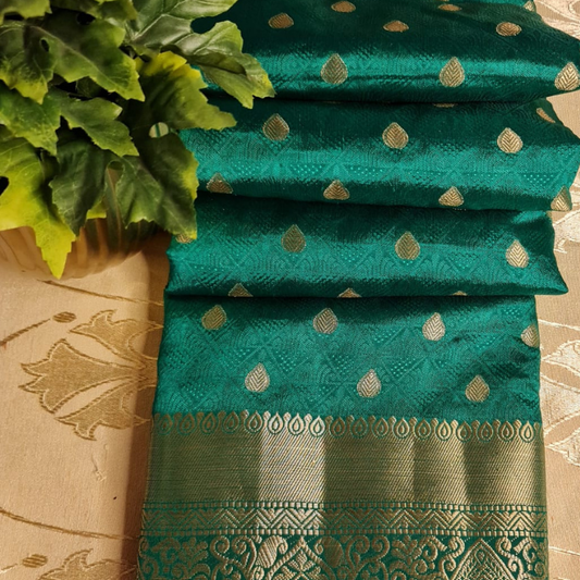 Green Benarasi silk blend saree with intricate gold zari detailing & motifs