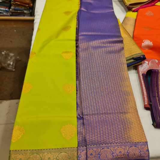 Kanchi Semi Silk saree with intricate gold zari detailing-green & purple