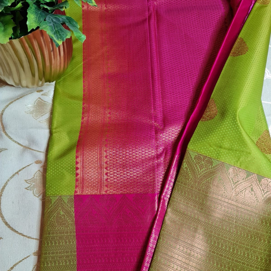 Kanchi Semi Silk saree with intricate gold zari detailing-green & magenta