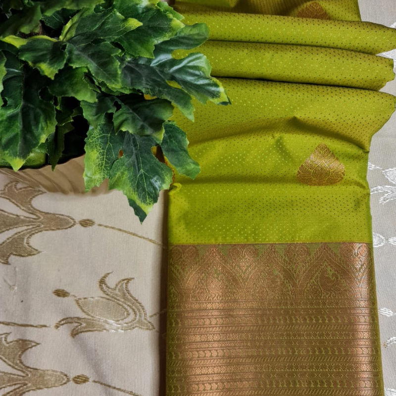 Kanchi Semi Silk saree with intricate gold zari detailing-green & magenta