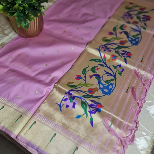 Light Pink Paithani saree with traditional peacock & lotus motifs in gold zari border with tassels