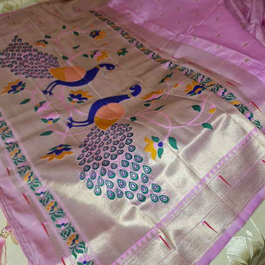 Handwoven Light Pink color Paithani saree with traditional colorful peacock and lotus motifs in gold zari border with tassels 