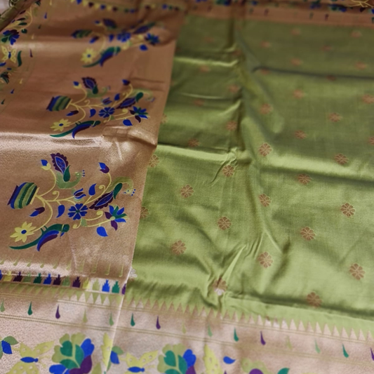 Lime Green color Paithani saree with traditional peacock & lotus motifs in gold zari border with tassels