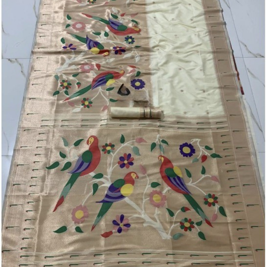 Off White Paithani saree with traditional peacock & lotus motifs in gold zari border with tassels