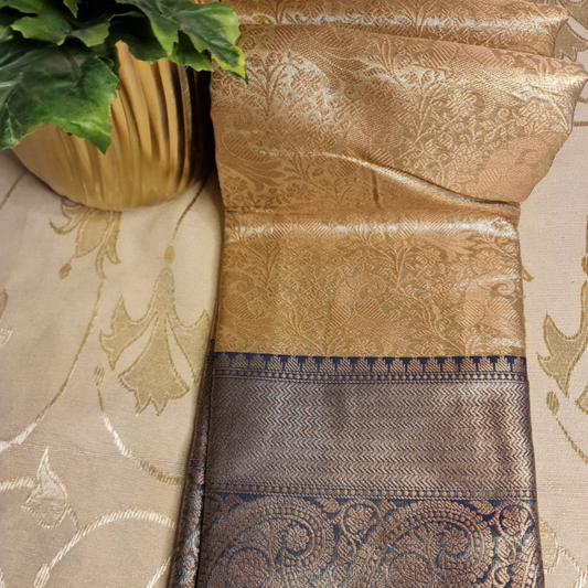 Intricately woven Gold Organza Saree with Navy Blue Brocade Border – Elegant Drape