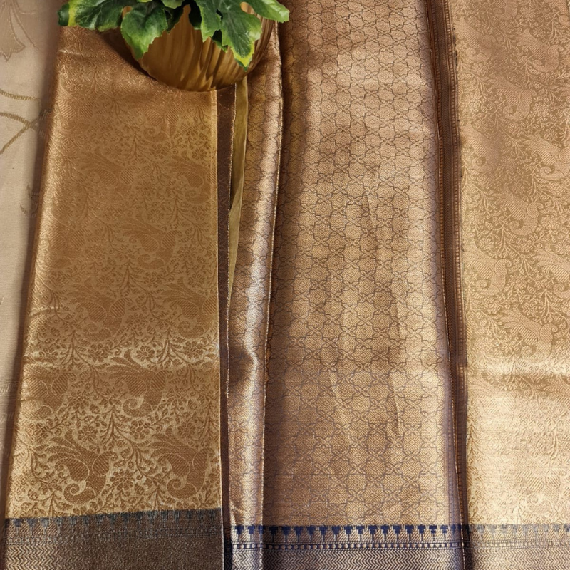 Intricately woven Gold Organza Saree with Navy Blue Brocade Border – Elegant Drape