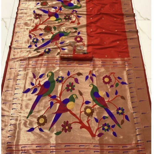 Red Paithani saree with traditional peacock & lotus motifs in gold zari border with tassels