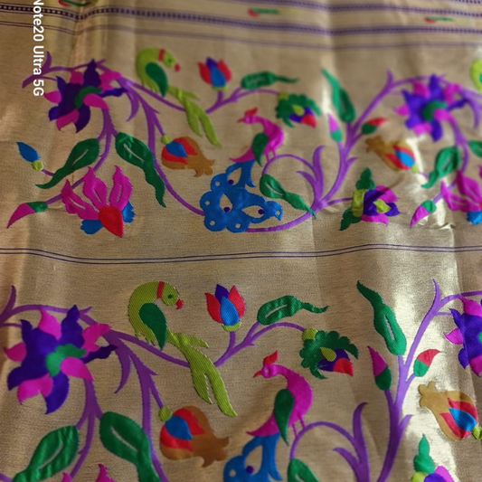 Royal Blue Paithani saree with traditional peacock & lotus motifs in gold zari border with tassels